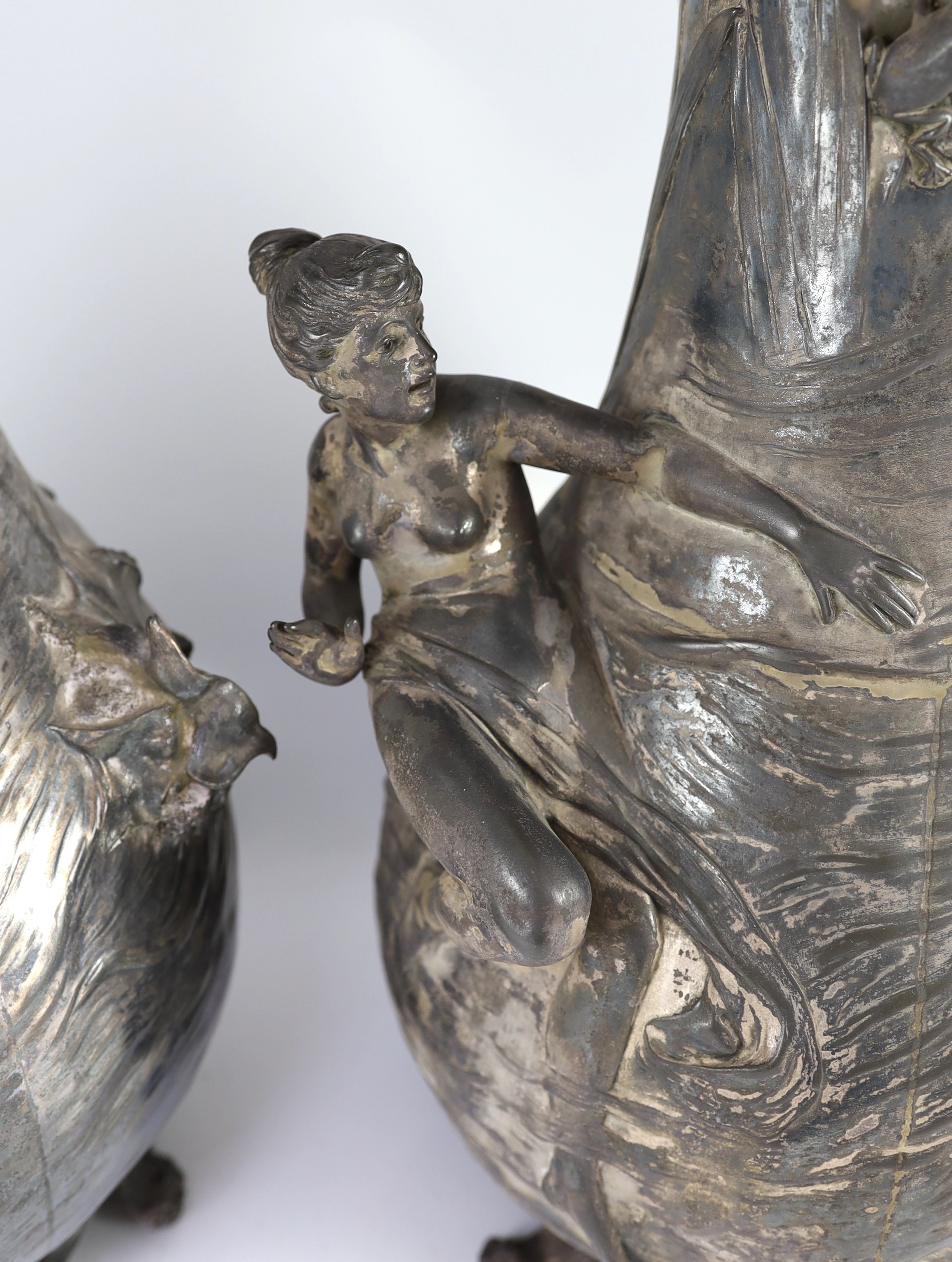 A pair of very large WMF Art Nouveau silvered pewter vases, height 61cm